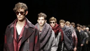 Models wear creations for Salvatore Ferragamo men's Fall-Winter 2015-2016 collection, part of the Milan Fashion Week, unveiled in Milan, Italy, Sunday, Jan. 18, 2015. (AP Photo/Luca Bruno)